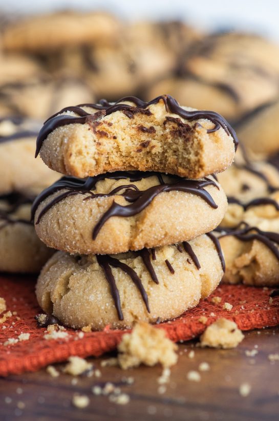 Peanut Butter Thumbprint Cookies are a peanut butter lovers favorite cookie recipe and perfect for Christmas cookie exchanges!