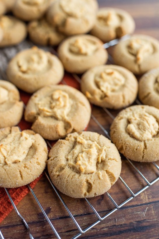 The Peanut Butter Thumbprint Cookies recipe ready to be drizzled with chocolate
