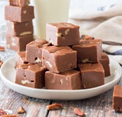 Secret Ingredient Fudge recipe is made with Velvetta Cheese and a great Christmas dessert! It’s fudgy, rich, and has the perfect texture. Enjoy it straight from the fridge for the ultimate holiday snack!
