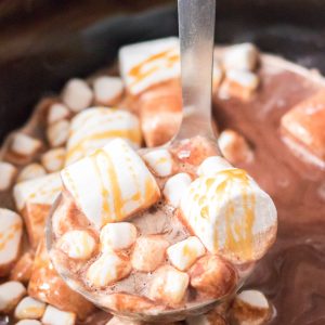 Crock Pot Caramel Hot Chocolate is an incredibly simple big batch recipe for the holidays or any occasion that packs a wonderful chocolate flavor punch and is super creamy deliciousness!