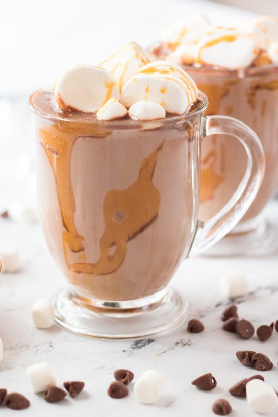 Slow Cooker Caramel Hot Chocolate is an incredibly simple big batch recipe for the holidays or any occasion that packs a wonderful chocolate flavor punch and is super creamy deliciousness!