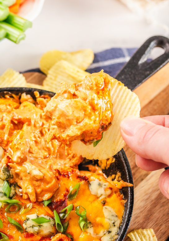 Buffalo Chicken Wing Dip recipe takes the delicious taste of buffalo chicken wings and puts them in an easy dip. With just 5 ingredients, you are sure to fall in love with this easy appetizer dip!