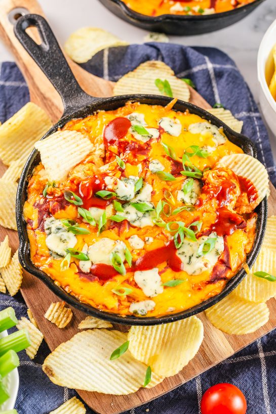 Overhead shot of Buffalo Chicken Wing Dip recipe takes the delicious taste of buffalo chicken wings and puts them in an easy dip. With just 5 ingredients, you are sure to fall in love with this easy appetizer dip!