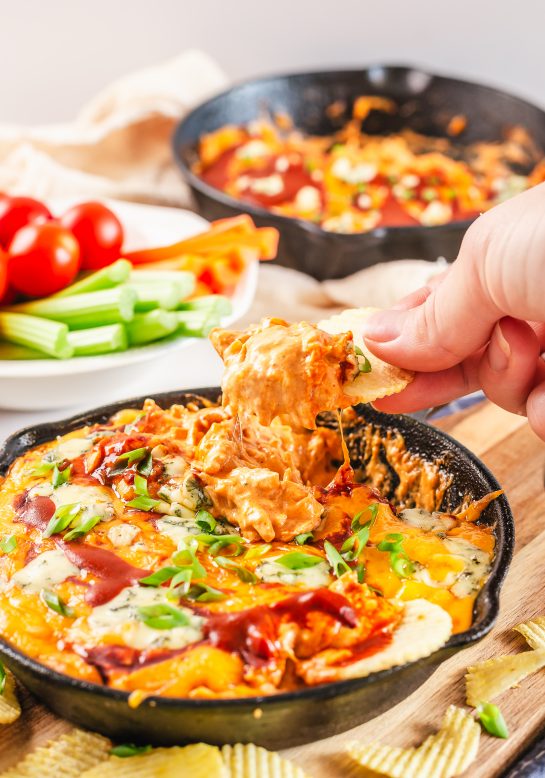 Delicious Buffalo Chicken Wing Dip recipe takes the delicious taste of buffalo chicken wings and puts them in an easy dip. With just 5 ingredients, you are sure to fall in love with this easy appetizer dip!