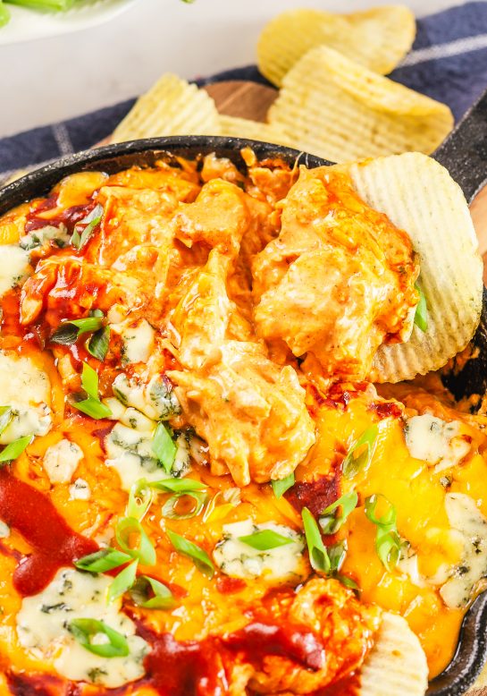 Buffalo Chicken Wing Dip recipe takes the traditional taste of buffalo chicken wings and puts them in an easy dip. With just 5 ingredients, you are sure to fall in love with this easy appetizer dip!