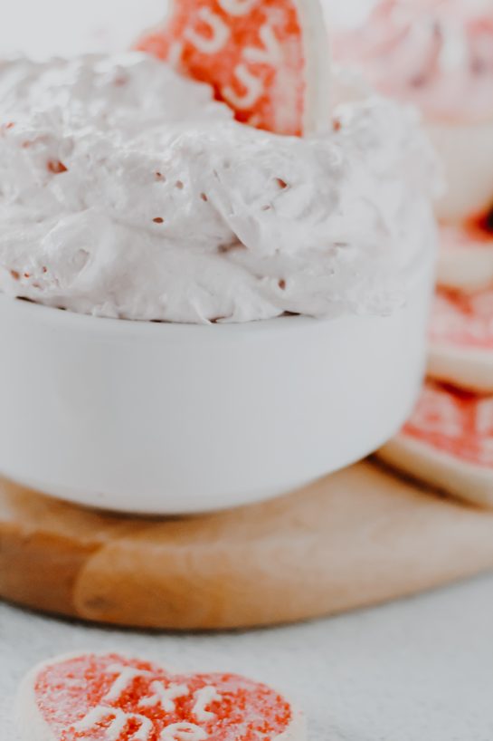Strawberry Cake Mix Dip is one of the first dessert dip recipes I fell in love with as a child and I can never get enough of it. All you need is three simple ingredients and it's perfect for Valentine's Day or any occasion!