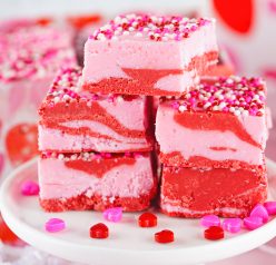 Layered Valentine's Day Strawberry Fudge recipe requires just four ingredients and can be made in under 10 minutes! Pretty and super cute gift for your Valentine.