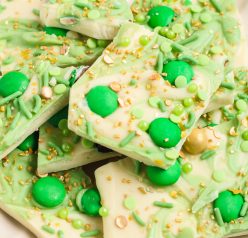 Leprechaun Bark candy recipe is loaded with colorful and green, festive toppings. It’s a different flavor and texture in every bite, tastes great, and is perfect for St. Patrick's Day!