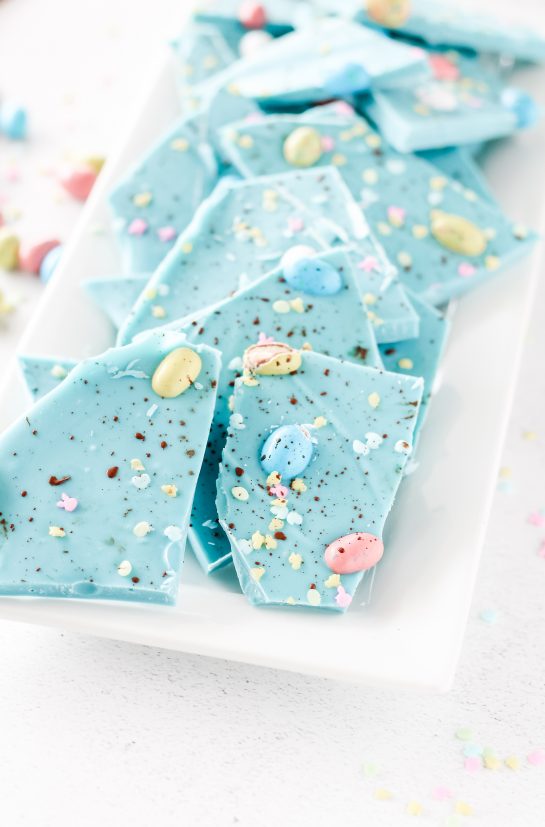 No-Bake Robin Egg Easter Bark show stopping beautiful blue Easter Bark. Super simple and easy to make, topped with chocolate candy eggs is the cutest dessert for Easter Sunday!