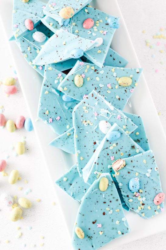 No-Bake Robin Egg Easter Bark show stopping beautiful blue Easter Bark. Super simple and easy to make, topped with chocolate candy eggs is the cutest dessert for Easter!