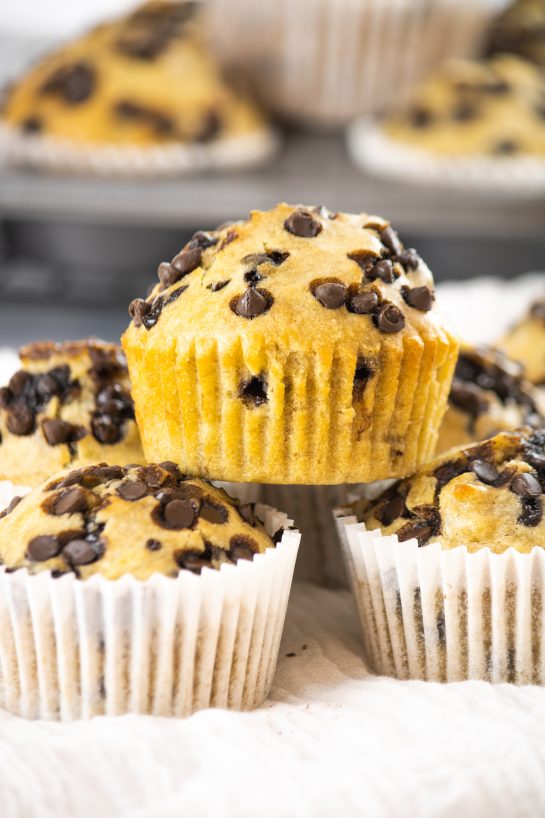 Quick and easy Banana Chocolate Chip Muffins recipe loaded with mini chocolate chips and fresh bananas. This warm treat can be enjoyed by your family on any given day and only needs a few pantry ingredients.