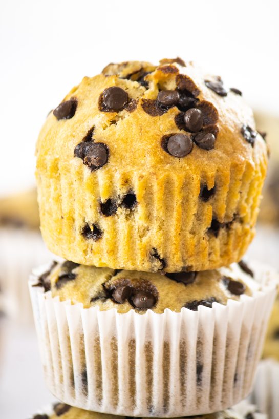 Melt-in-your-mouth Banana Chocolate Chip Muffins recipe loaded with mini chocolate chips and fresh bananas. This warm treat can be enjoyed by your family on any given day and only needs a few pantry ingredients.