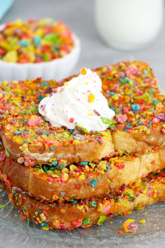 Quick Air Fryer Fruity Pebble French Toast is a classic French toast recipe made with a sweet and crispy cereal coating right in the air fryer. This Fruity Pebbles French toast is a fun twist on a favorite breakfast or brunch!