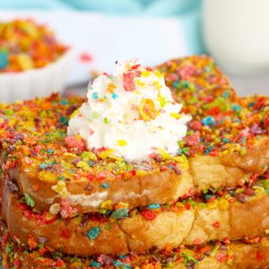 Easy Air Fryer Fruity Pebble French Toast is a classic French toast recipe made with a sweet and crispy cereal coating right in the air fryer. This Fruity Pebbles French toast is a fun twist on a favorite breakfast or brunch!