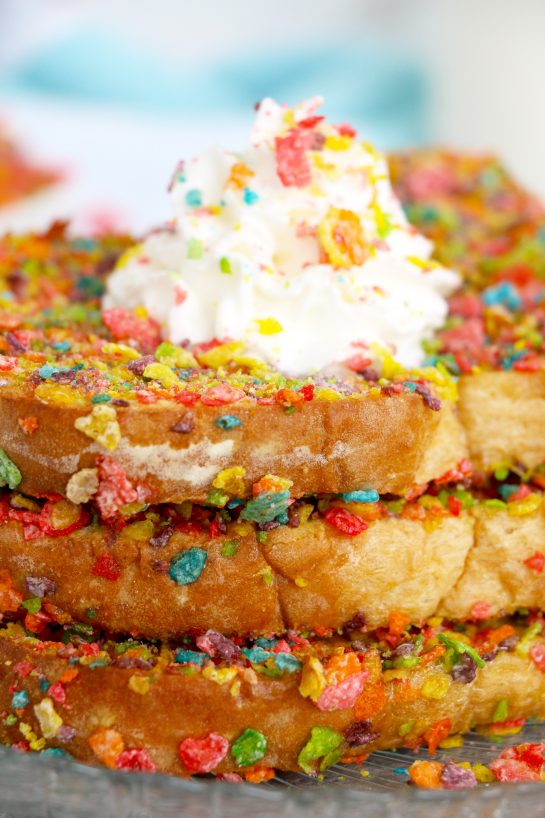 Air Fryer Fruity Pebble French Toast is a classic French toast recipe made with a sweet and crispy cereal coating right in the air fryer. This Fruity Pebbles French toast is a new twist on a beloved, favorite breakfast or brunch!