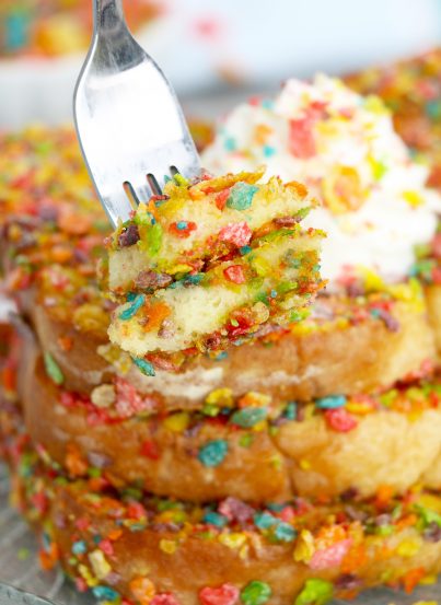 Air Fryer Fruity Pebble French Toast is a classic French toast recipe made with a sweet and crispy cereal coating right in the air fryer. This Fruity Pebbles French toast is a new twist on a classic favorite breakfast or brunch!