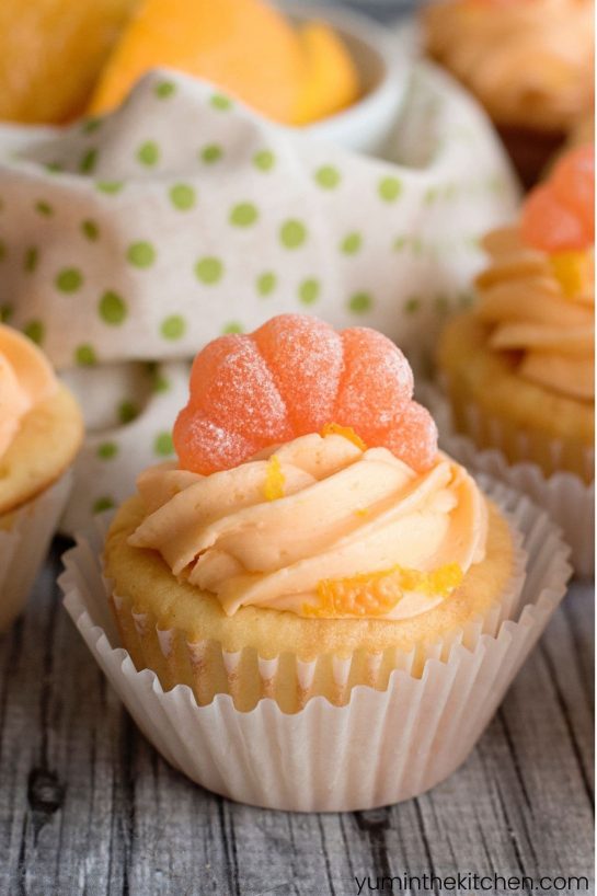 Whip up some easy orange creamsicle cupcakes recipe using vanilla cupcakes made with cake mix and topped with a tangy orange buttercream icing.