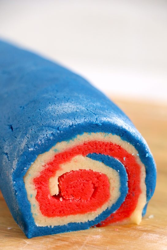 Easy Patriotic Pinwheel Cookies recipe ready to be sliced and baked