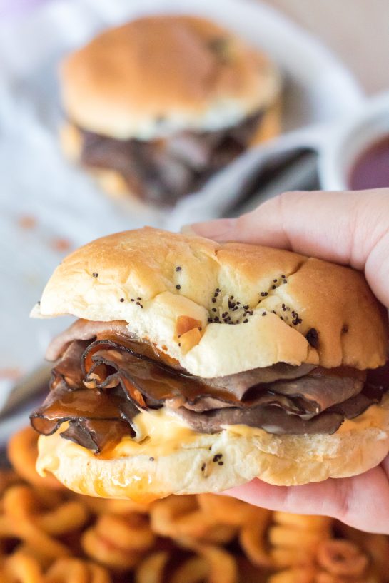 These Copycat Arbys Beef & Cheddars are the ultimate copycat recipe! They taste just like the real thing except you get to skip the drive-thru fast food line and it’s faster!  Onion buns, roast beef, cheddar sauce and the secret red sauce (French dressing) make these sandwiches come together in minutes!