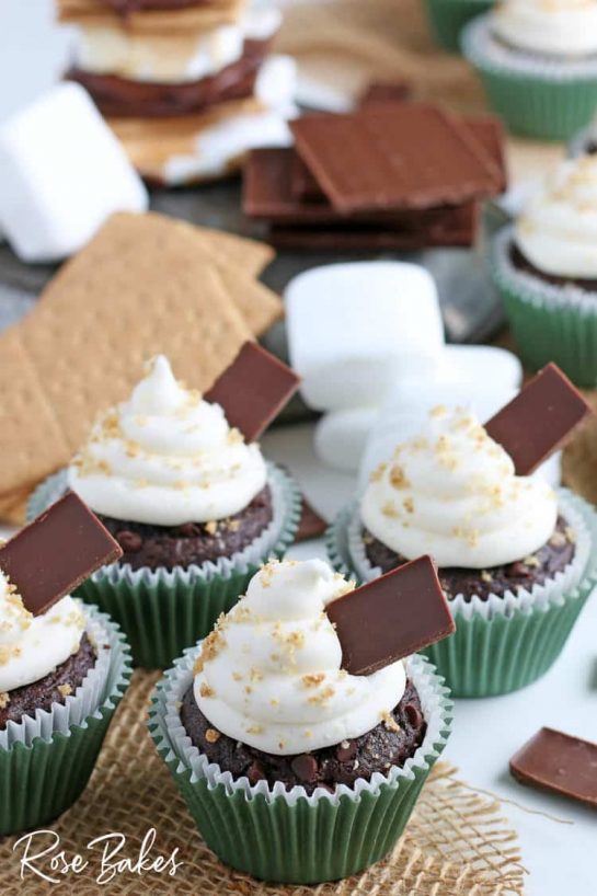 These S'mores Cupcakes are a perfect dessert! Rich chocolate cupcakes with a graham cracker bottom and topped with the creamiest marshmallow frosting!