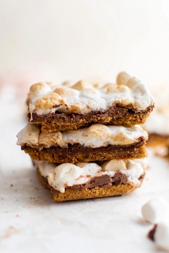 These S’mores Bars are the perfect way to get your s’mores fix without having to build a campfire. The graham cracker and biscoff cookie crust is crunchy and sweet, and the chocolate and marshmallow topping is decadent and delicious making a perfect pairing.