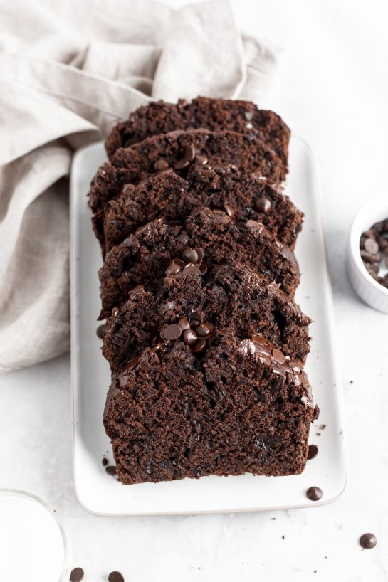 Moist and fudgy Chocolate Zucchini Bread recipe is filled with shredded zucchini and no one will be any the wiser since it tastes just like chocolate cake. It’s super delicious and secretly healthy with hidden green veggies.