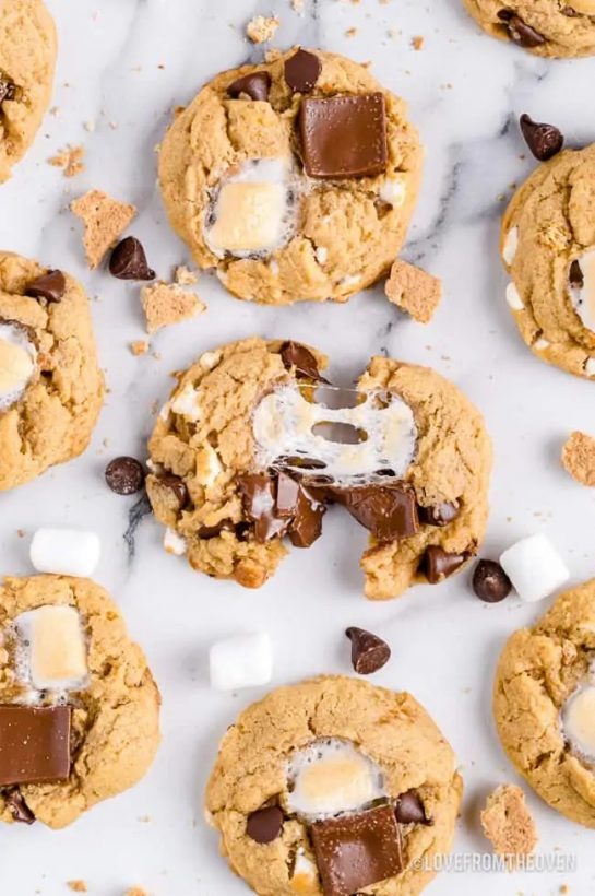 This easy Smores Cookie Recipe combines the classic flavors of chocolate, marshmallow and graham crackers into one delicious cookie. To take it to the next level, peanut butter joins the party to create a cookie that your friends and family will rave about!