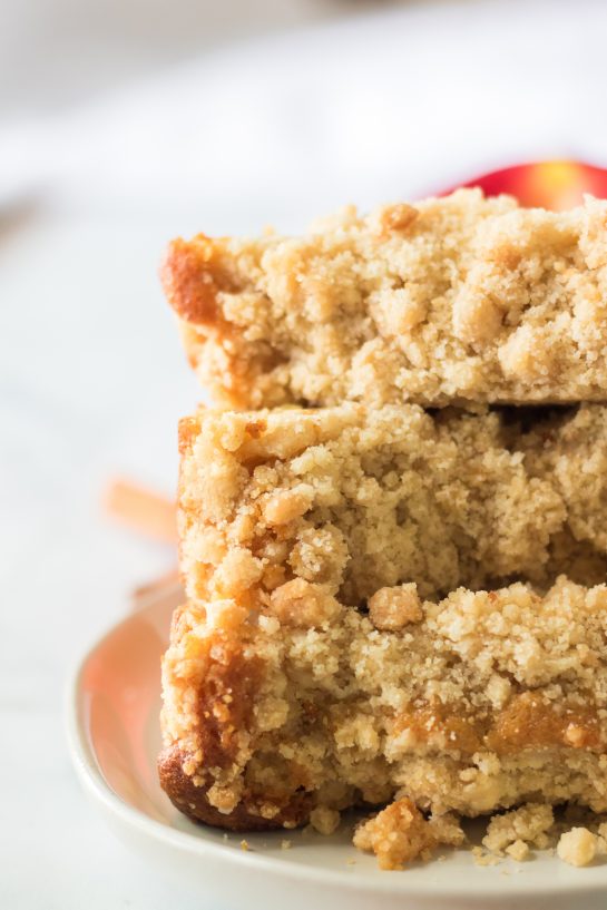 Delicious Apple Streusel Coffee Cake fall dessert recipe just perfect for Fall! This soft, moist cake is easy to make because it starts with a box mix that you doctor up with apples and a crunchy cinnamon streusel topping. 