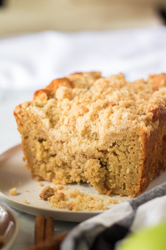 Delicious Apple Streusel Coffee Cake fall dessert recipe just perfect for Fall! This soft, moist cake is easy to make because it starts with a box mix that you jazz up with apples and a crunchy cinnamon streusel topping. 