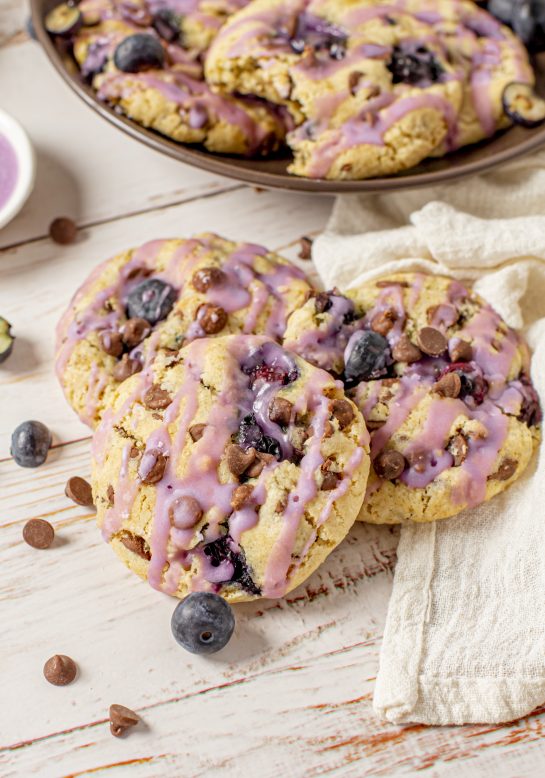 Glazed Blueberry Oatmeal Chocolate Chip Cookies that are thick, soft, and chewy oatmeal cookies that are perfectly spiced and stuffed full of fresh blueberries!