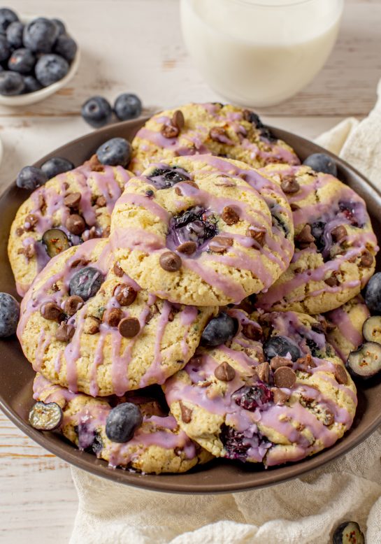 Blueberry Oatmeal Chocolate Chip Cookies are deliciously thick, soft, and chewy oatmeal cookies that are perfectly spiced and stuffed full of fresh blueberries!