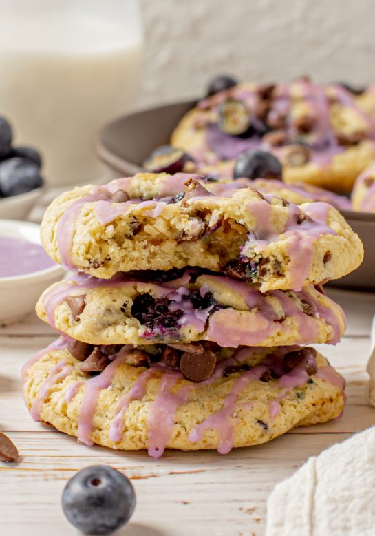 Glazed Blueberry Oatmeal Chocolate Chip Cookies that are thick, soft, and chewy oatmeal cookies that are perfectly spiced and stuffed full of fresh or frozen blueberries!