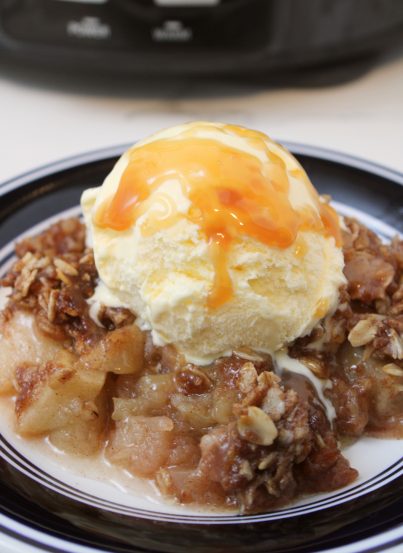 Crock Pot Apple Crisp is the perfect fall dessert recipe and it couldn’t be easier to make! It requires super simple ingredients, minimal prep, and then you set it and forget it. Then, you can end your day with warm apple crisp that everyone will not be able to stop talking about.