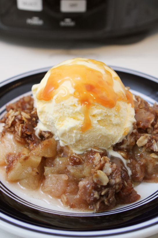 Crock Pot Apple Crisp is the perfect fall dessert recipe and it couldn’t be easier to make! It requires super simple ingredients, minimal prep, and then you set it and forget it. Then, you can end your day with warm apple crisp that everyone will not be able to stop talking about.