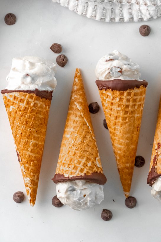 Easy Ice Cream Cannoli Cones recipe is a cute twist on the classic Italian dessert recipe! The cannoli cream is super easy to make with just 5 ingredients! Perfect for holidays!