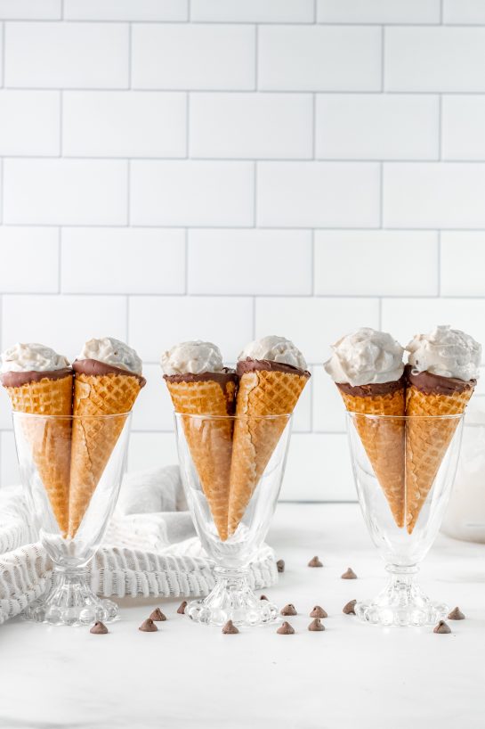 Easy Ice Cream Cannoli Cones recipe is an adorable twist on the classic Italian dessert recipe! The cannoli cream is super easy to make with just 5 ingredients!