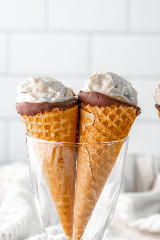 Easy Ice Cream Cannoli Cones recipe is a cute twist on the classic Italian dessert recipe! The cannoli cream is super easy to make with just 5 ingredients!