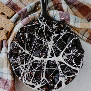 Overhead photo of the Spiderweb S'mores Dip recipe for Halloween