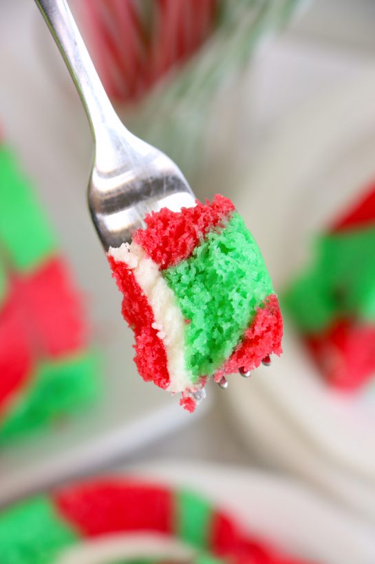 Christmas Cake Roll is a beautiful Holiday Dessert recipe or Treat for your friends and family! This cake is easy to make for the holidays and a fun twist on traditional cake, with the festive colors and look of Christmas!