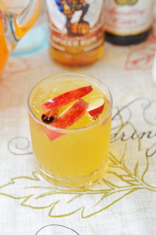 Pumpkin Sangria for a Crowd is a sweet, spiced, and full of fall flavors for the holiday season! This Pumpkin Sangria is perfect for autumn, Halloween pumpkin carving nights, Thanksgiving, or any party!