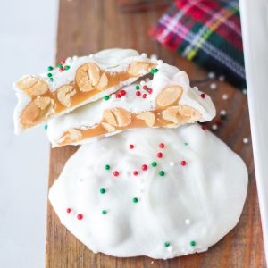 No-Bake Polar Bear Claws are a delicious holiday treat and classic candy recipe for Christmas! The luscious caramel and salty roasted peanuts are coated in a silky white chocolate coating. I top them with sprinkles for a festive touch. 