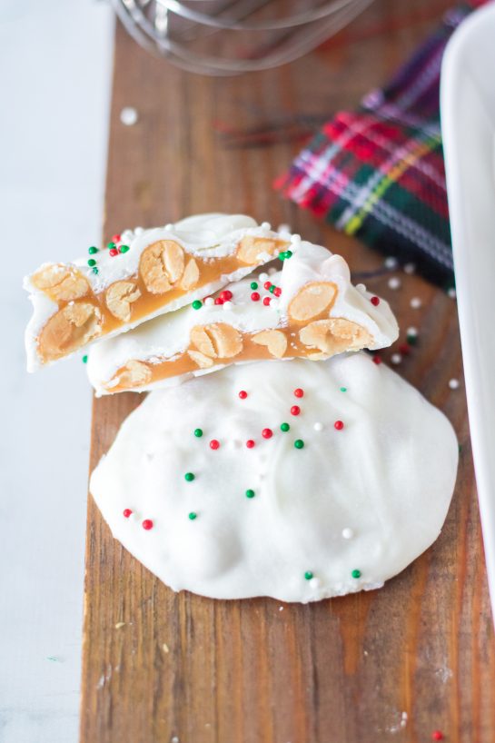 No-Bake Polar Bear Claws are a delicious holiday treat and classic candy recipe for Christmas! The luscious caramel and salty roasted peanuts are coated in a silky white chocolate coating. I top them with sprinkles for a festive touch. 