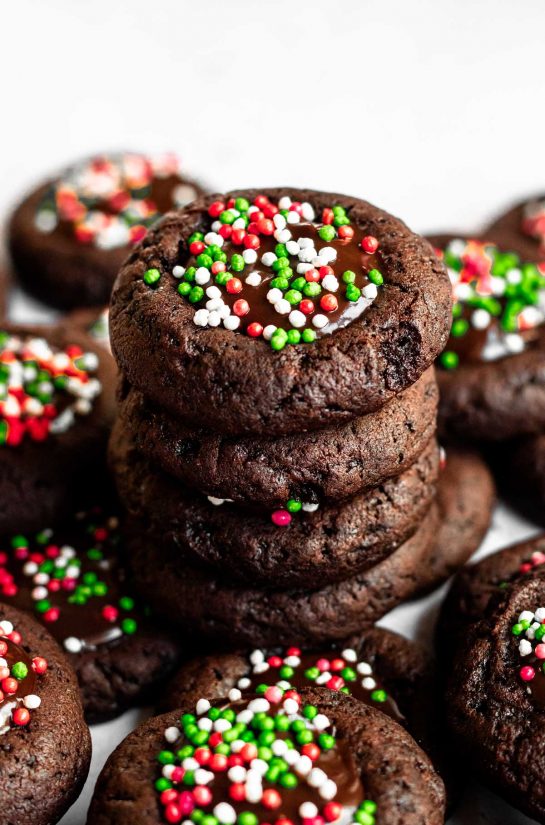 Double Chocolate Sprinkle Thumbprint Cookies recipe. Double the chocolate and add some colorful sprinkles to the mix for the perfect holiday cookie to share.