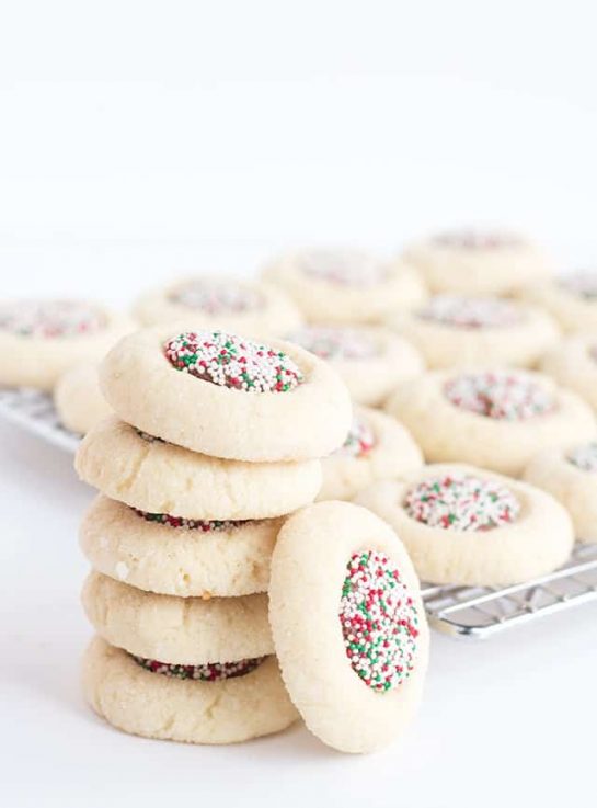 Candy Thumbprints recipe. This pretty thumbprint recipe is perfect for anyone who loves candy and cookies. Bring them together for the ultimate sweet treat.