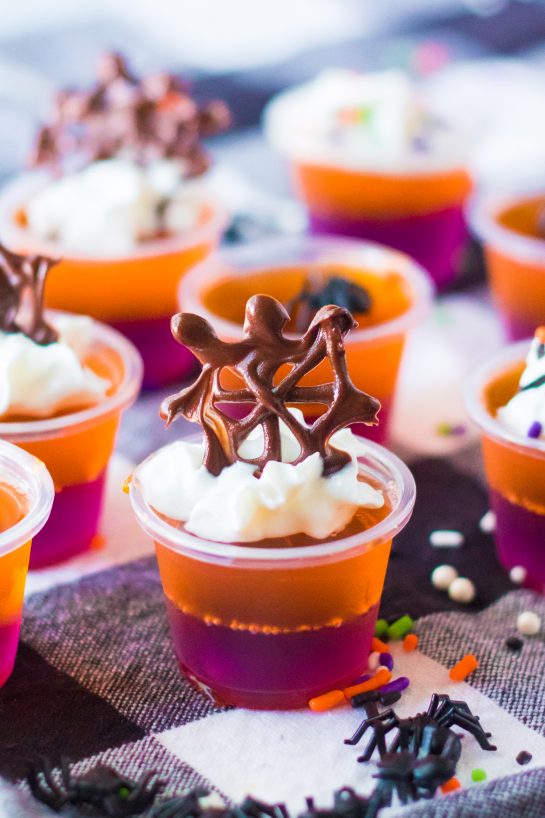 This recipe for Halloween Jello Shots are a colorful, fun Halloween party ideas. Learn how to make these cute Halloween shots because they will be a cocktail party favorite.