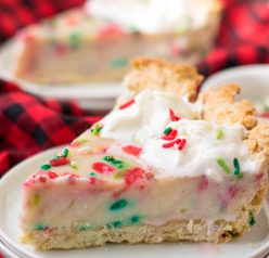 This Christmas Sugar Cream Pie recipe is my favorite for the holidays. This is a delicious creamy pie decorated with holiday sprinkles for a festive look. The filling is silky and rich - perfect for any occasion. The crust is a no-roll pie crust which makes it fabulous to throw together for the busy holiday season. 