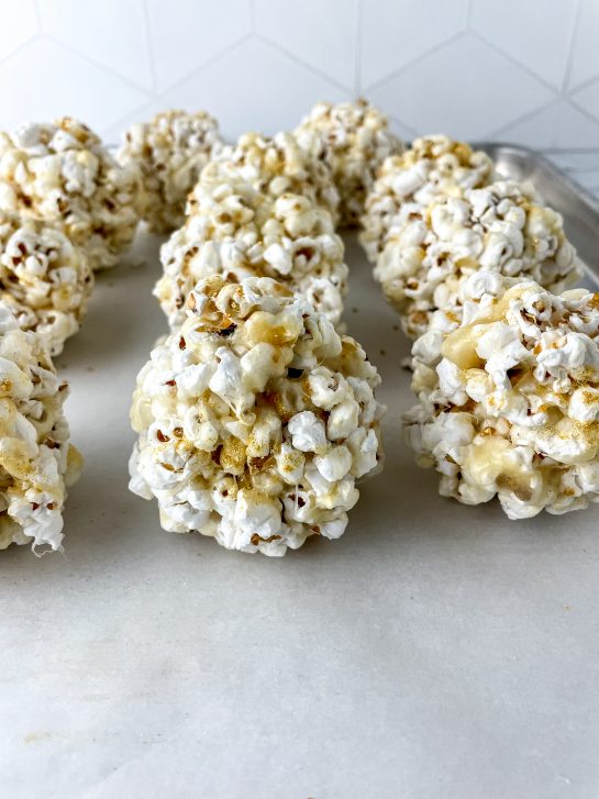 New Year Champagne Popcorn Balls are so sticky, tasty, and everyone will love them. They’re the perfect snack recipe for any party, holiday or get together, but especially New Year's Eve or New Year's Day dish to pass!