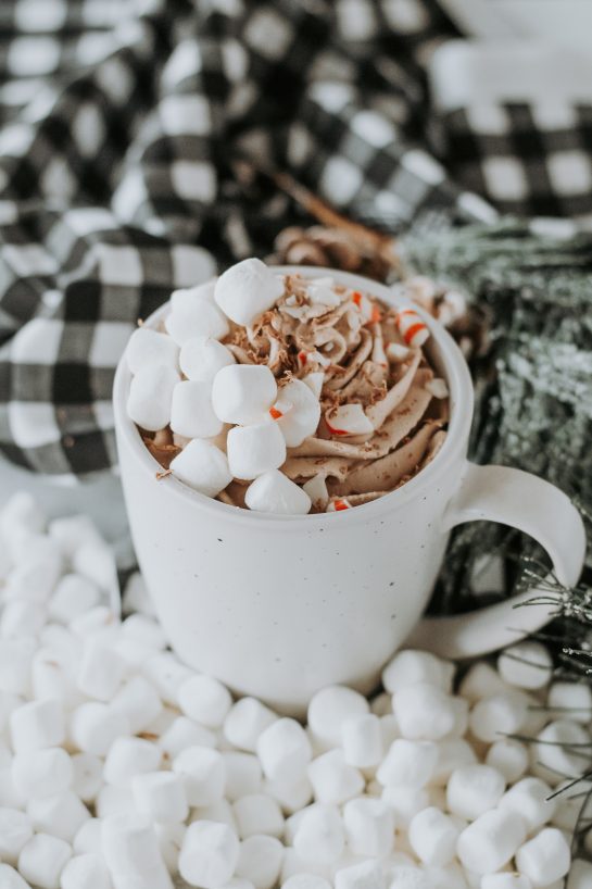 This easy Whipped Hot Chocolate recipe only requires four ingredients to make. It is a decadent hot cocoa that makes a regular hot cocoa even more delicious. You can make this drink warm or iced. You'll love this quick, but decadent drink!