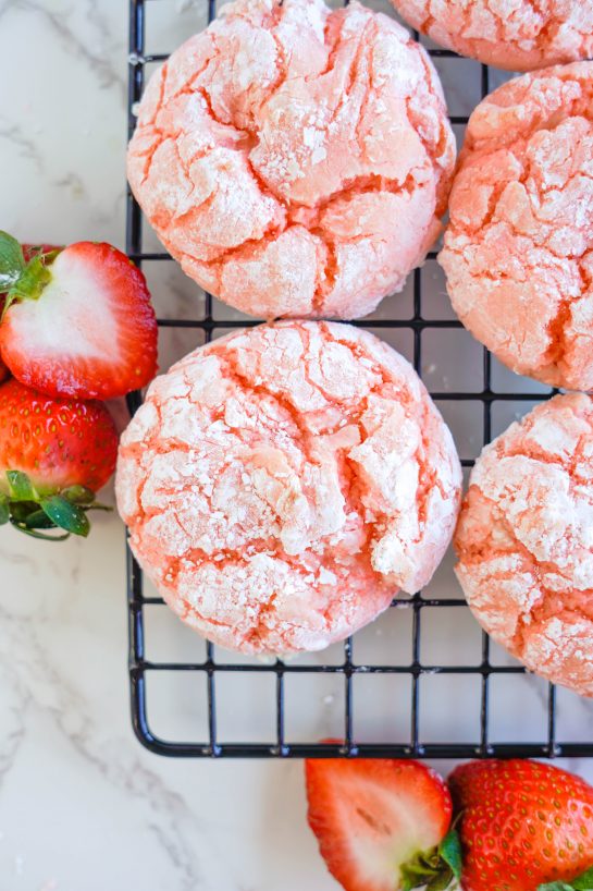 Strawberry Crinkle Cookies: an easy and delicious strawberry cookie recipe for Valentine's Day made with cake mix. If you're looking for the easiest cookie recipe on the planet, you found it! These cookies require just FIVE ingredients and come out perfectly every time.