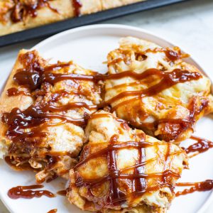 Sheet Pan BBQ Chicken Pizza has a crispy crust, tons of cheese, and tender chicken, with the sweetness of hickory barbecue sauce. It’s a snap to make!